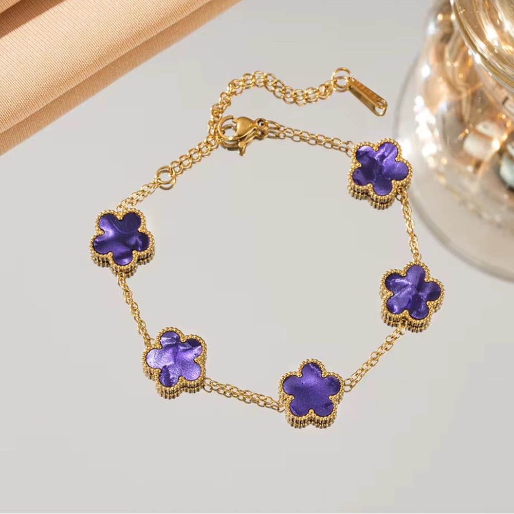 GOLD TONE &PURPLE CLOVER BRACELET